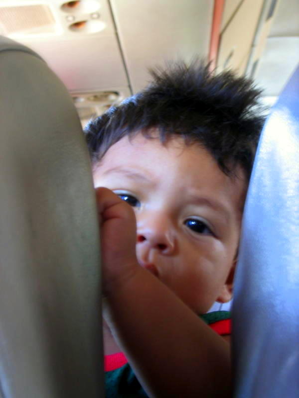 A little cutie on the "chicken bus" in Central America.