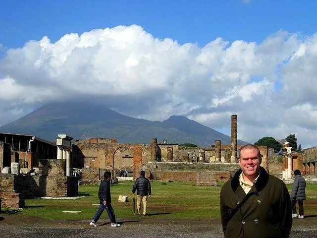 In Pompeii, Italy, with Mt. Vesuvius in the background.