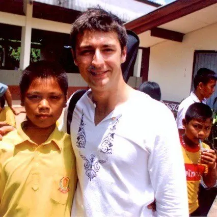 Alex and one of his students in Thailand.