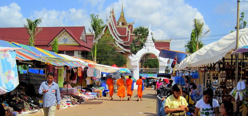 Orange-clad monks in beautiful Vientiane, Laos.