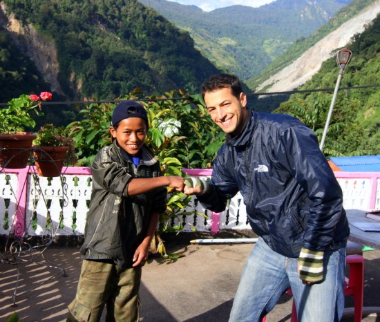 Brad with a happy student in Nepal!