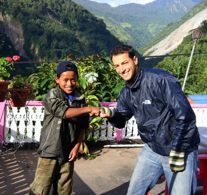 Brad with a happy student in Nepal!