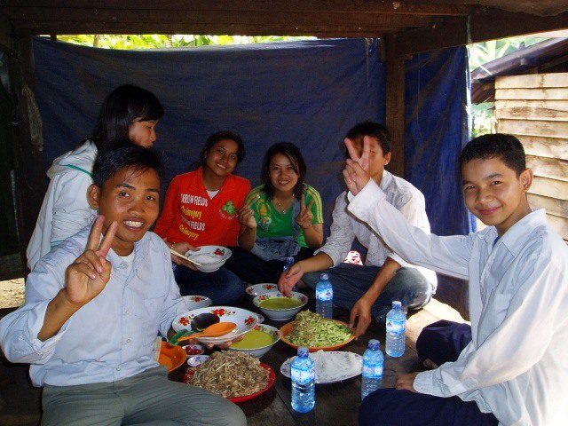 Some of Nikki's students invited her to their home for a small class party in the countryside for traditional Cambodian rice noodles and fresh young coconuts, July 2007.