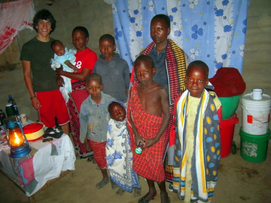 Volunteer Dan with his host family in Tanzania.