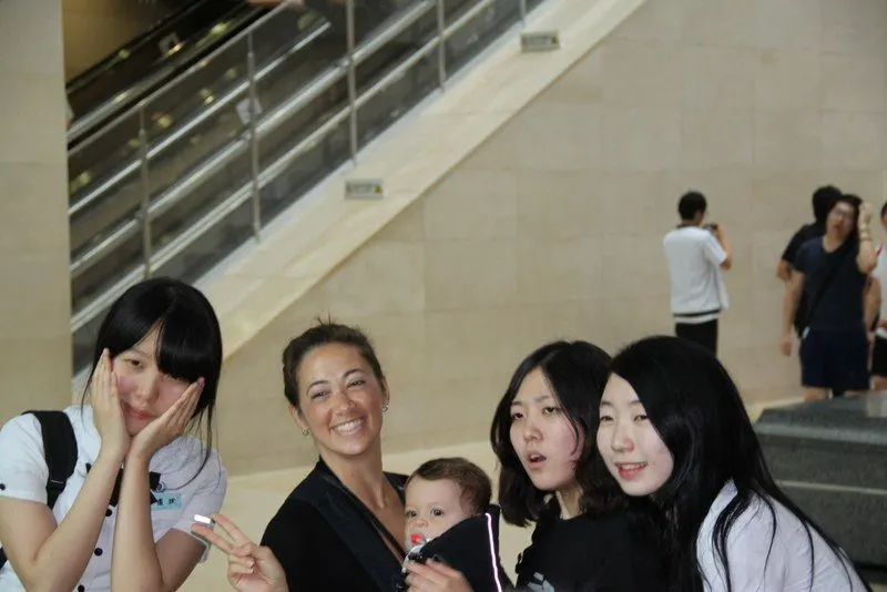 Stacey's son, Simon, with swarming teenage girls in Seoul, Korea, 2011!