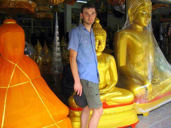 Chris in Bangkok at a Buddha factory outlet!