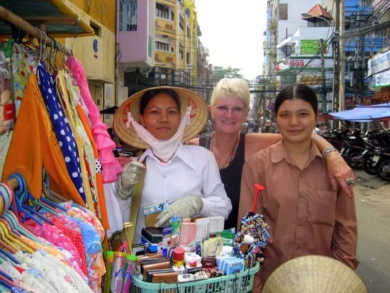 With ladies at the bustling market of Ho Chi Minh City, Vietnam.