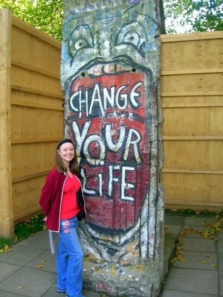 Mandy in front of a section from the Berlin wall that came from an area near the Brandenburg Gate and was acquired by Britain's Imperial War Museum in 1991.