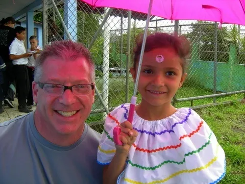 Scott with a young student during Costa Rica travel.