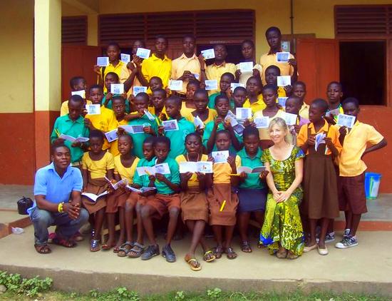 Sue in a beautiful dress with her class at Bantuma, Ghana.