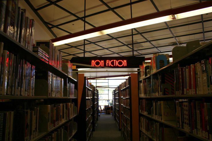Nonfiction neon sign, library