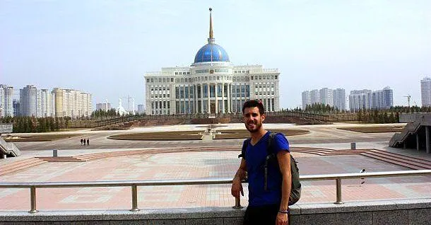 Ian posing in front of presidential palace in the futuristic city of Astana, Kazakhstan.