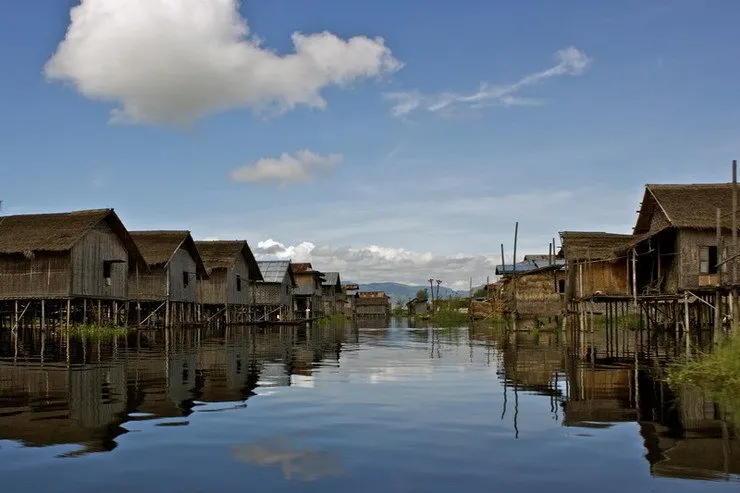 A typical yet surreal scene as one navigates the villages of Inle Lake.