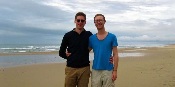 Zab and Sam on a beach in Uruguay.