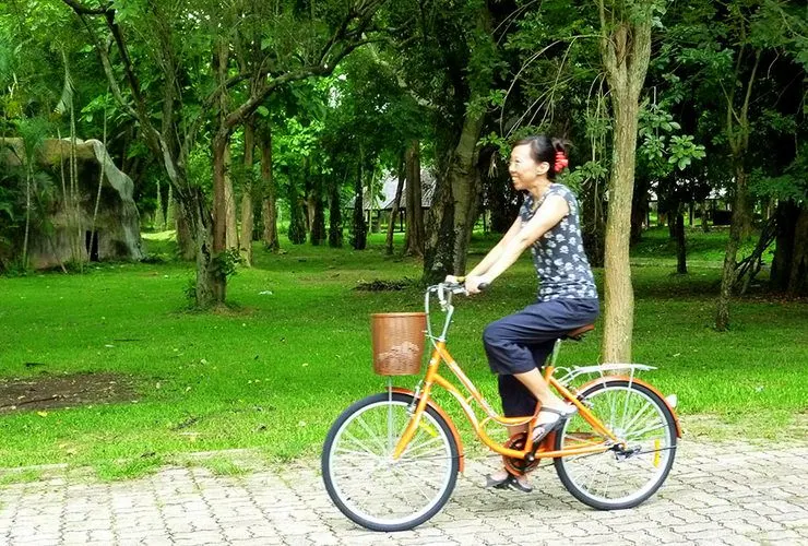 Lani on her new bicycle, Chiang Rai, Thailand, 2014.