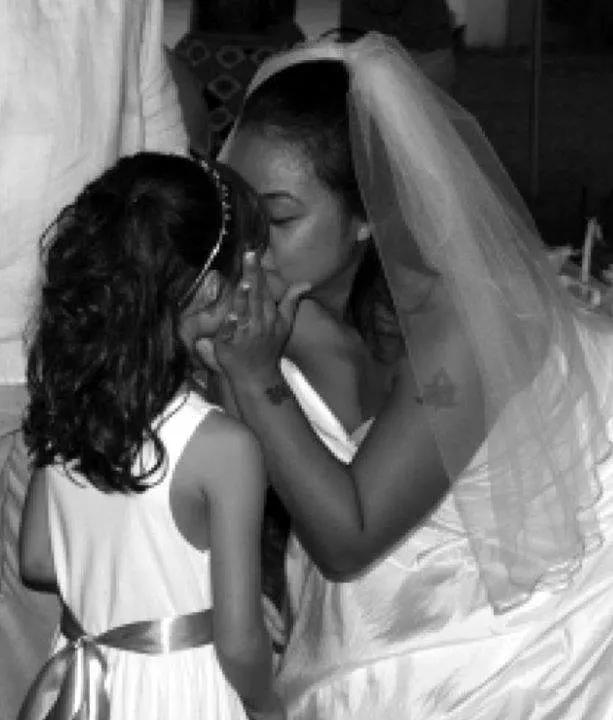 Clarissa including her daughter, Malia in her wedding ceremony, August 2011.