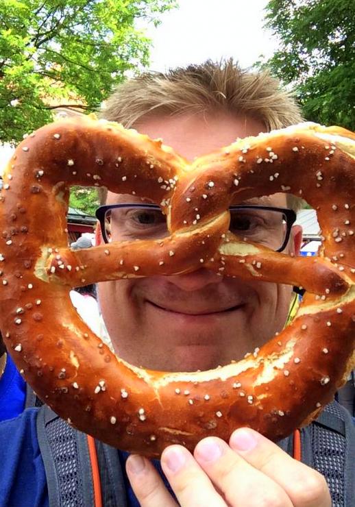 Mike with a giant pretzel in Munich.