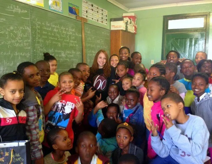 Stephanie with students in South Africa.