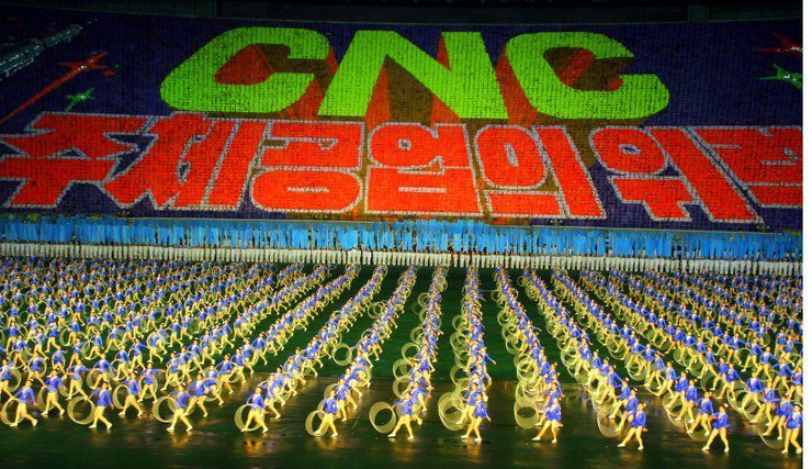 The highly politicized, patriotic Mass Games in Pyongyang, North Korea is a synchronized socialist-realist spectacular, featuring over 100,000 participants in gymnastics, dance, acrobatics and song.