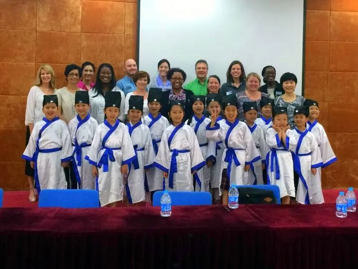Candace and her colleagues with some of the sweet first graders from the Xu Guangqi Primary School in Shanghai, China.