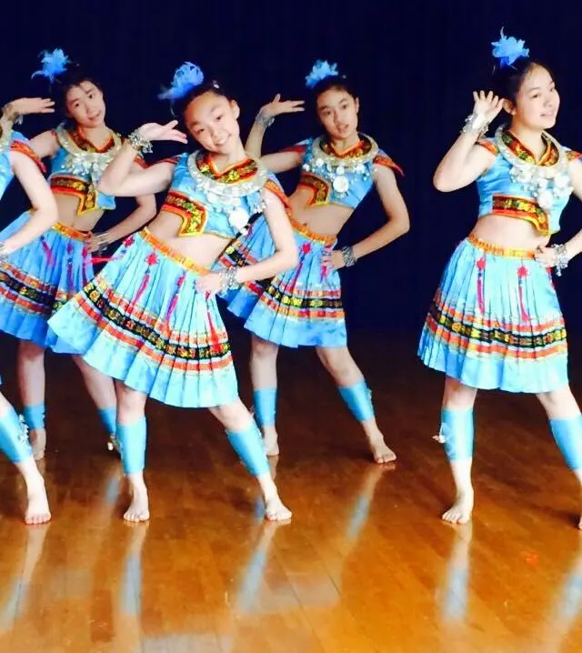 Some amazing middle school dancers in Shanghai. They were dressed in a costumed version one of the ethnic minorities in China. Beautiful!