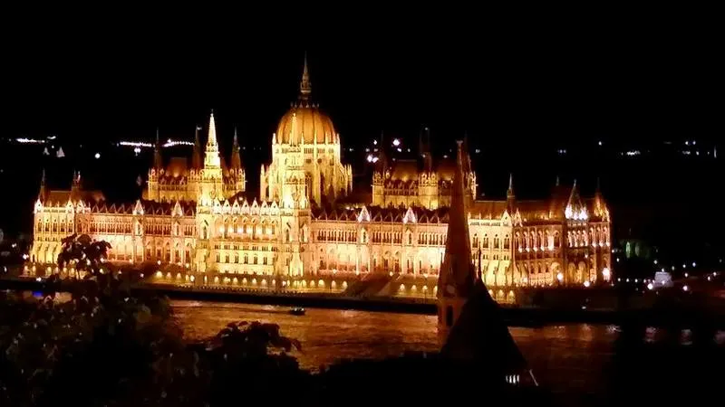 Parliament Building in Budapest, Hungary, as seen from the Castle District of Buda, across the Danube River.