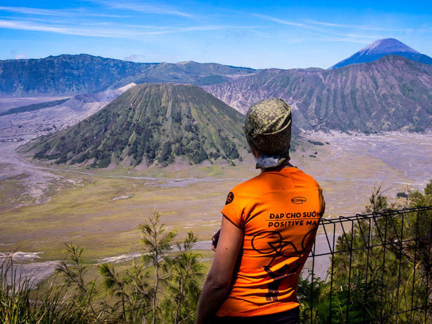 Jane takes in the beauty of Mount Bromo, Indonesia after a long, steep climb.