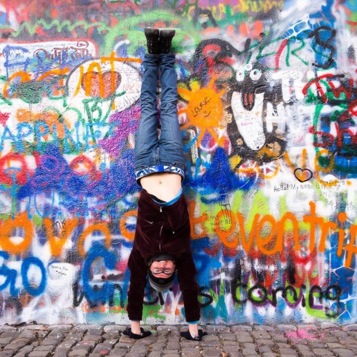 Handstand in front of a famous graffiti wall in Prague.