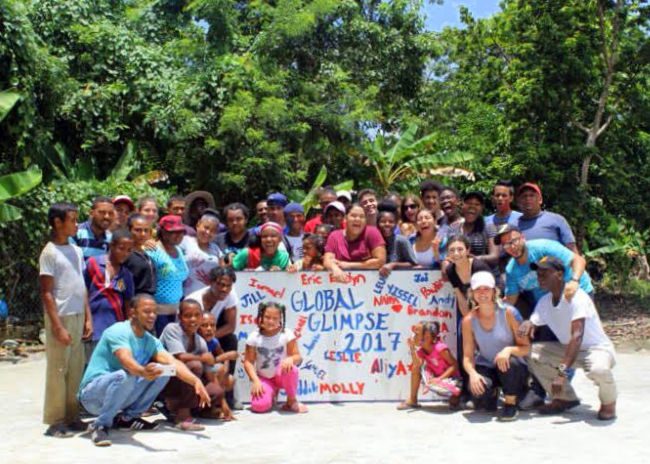 The backboard for the playground, with the whole Global Glimpse team.