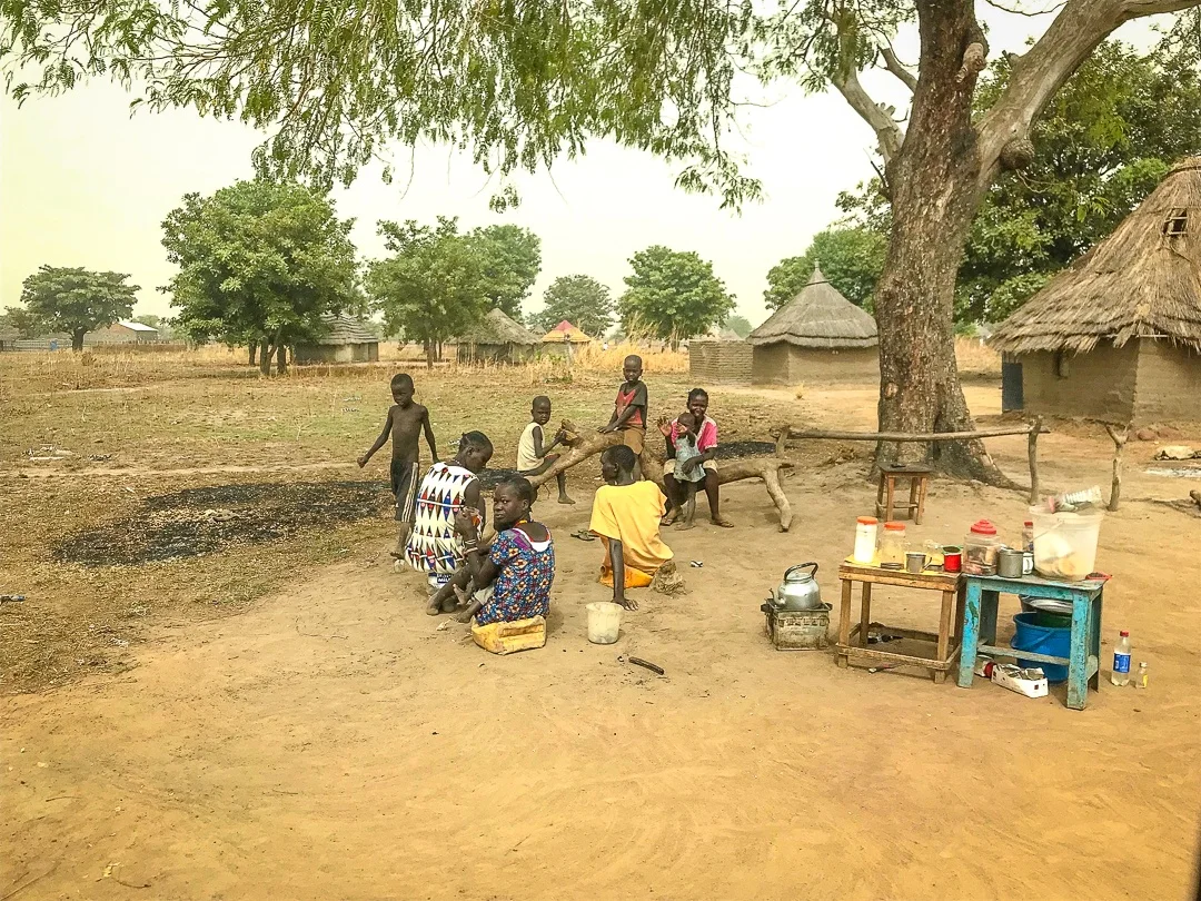 Eating under a tree in South Sudan.