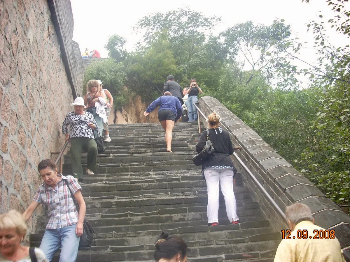 Climbing the Great Wall of China.