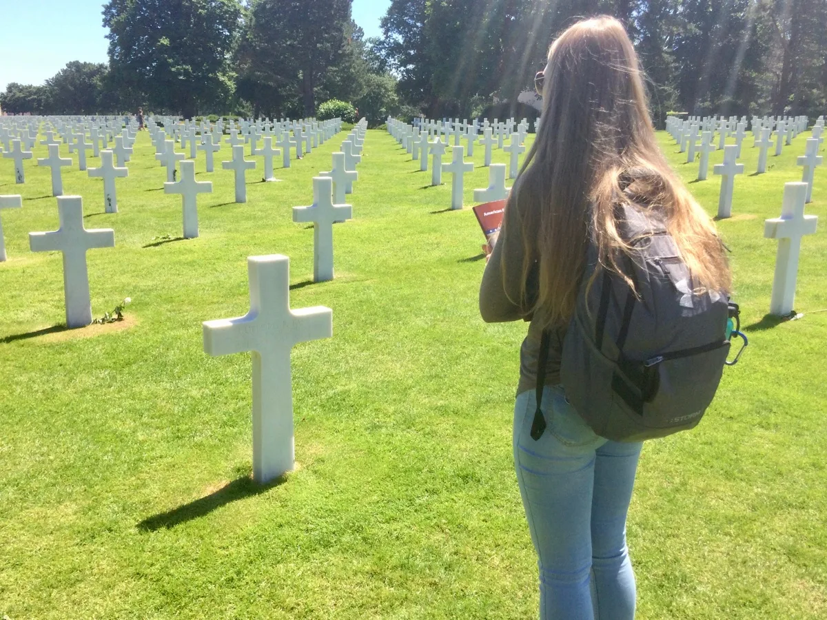 A student found her relative's grave site at the American Cemetery in Normandy, France.