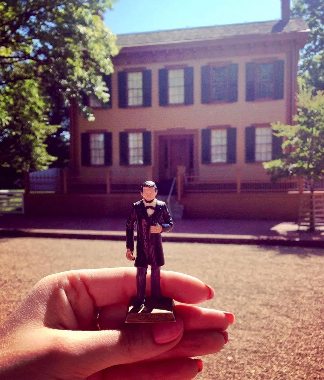 Lincoln house with toy figurine 