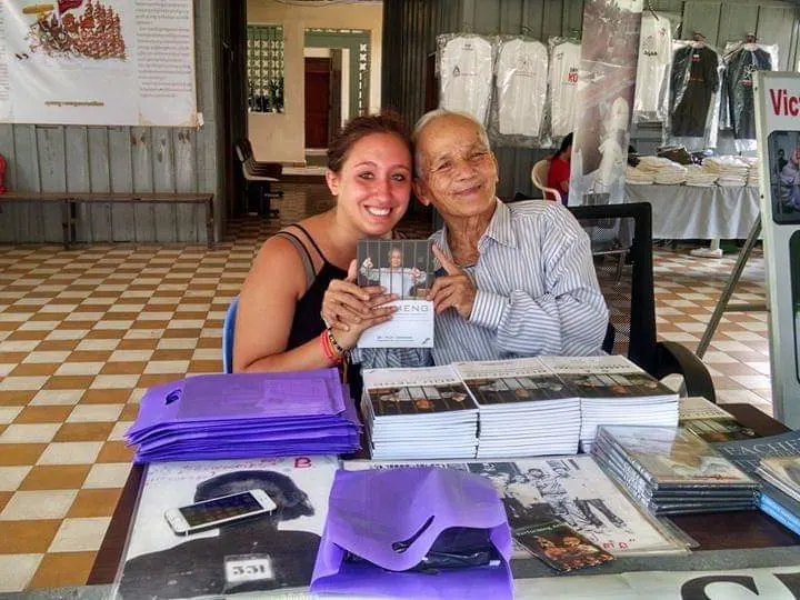 This photo was taken during a visit to the Cambodian Genocide memorial and museum. The gentleman (Bou Meng) in the photo is the Cambodian genocide survivor that Stephanie was able to meet with. She purchased his book to use in her class.